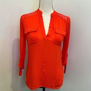 Orange Blouse ith open back and roll up sleeves